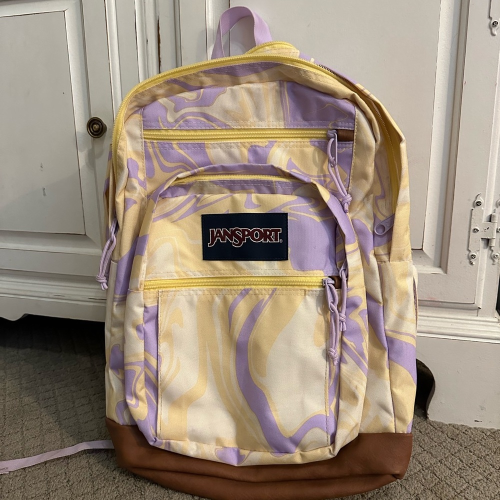 JanSport Swirl Pattern Backpack in Yellow and Purple